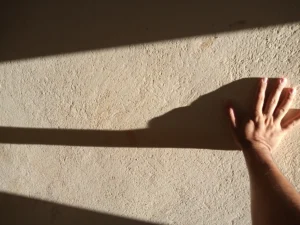 Hand wall illuminated by sunlight