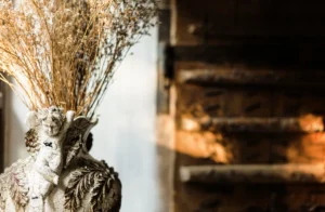 Old vase with stone angels